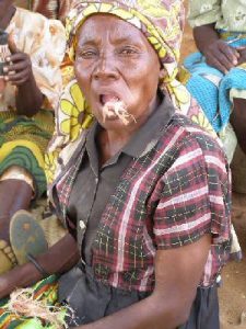 Lady chewing baobab fibers