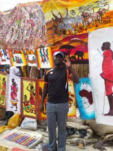 African Artisan at his stall in Kenya, Africa.