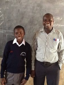 Otieno with Headmaster