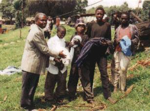 Boys receiving clothing